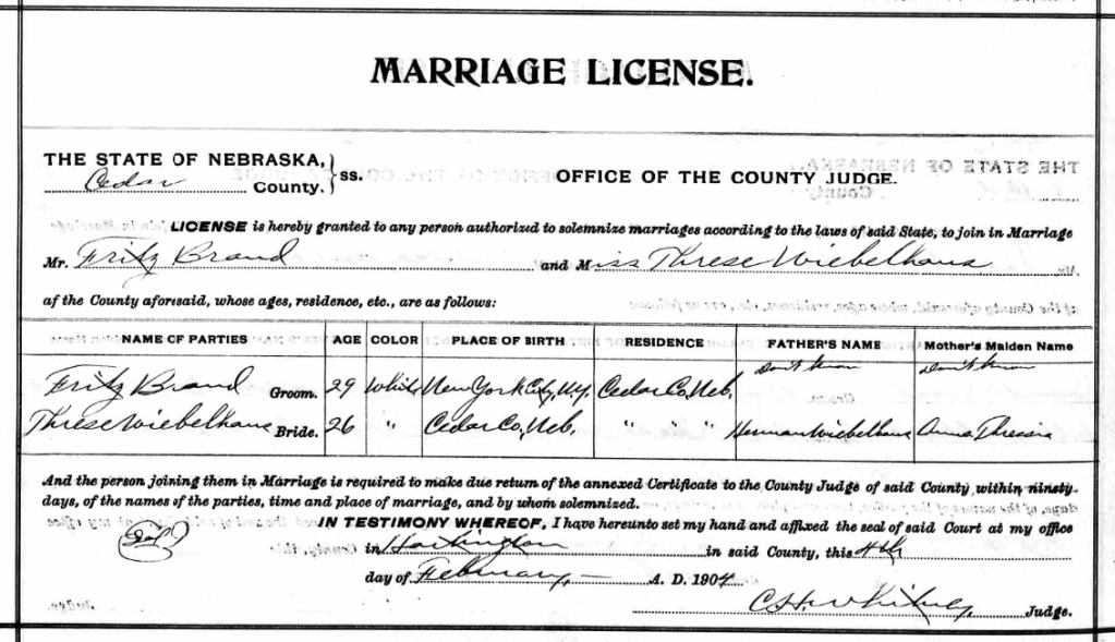 A marriage license document issued in the State of Nebraska, outlining the details of the groom and bride, including their names, ages, places of birth, and residences.